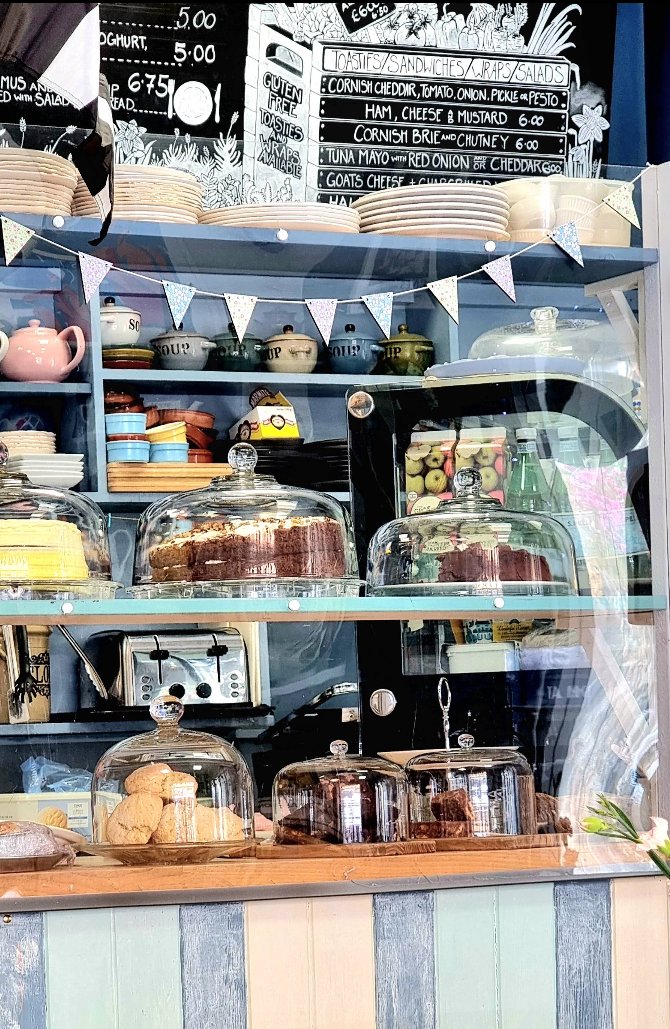 Cakes and baked treats behind the counter