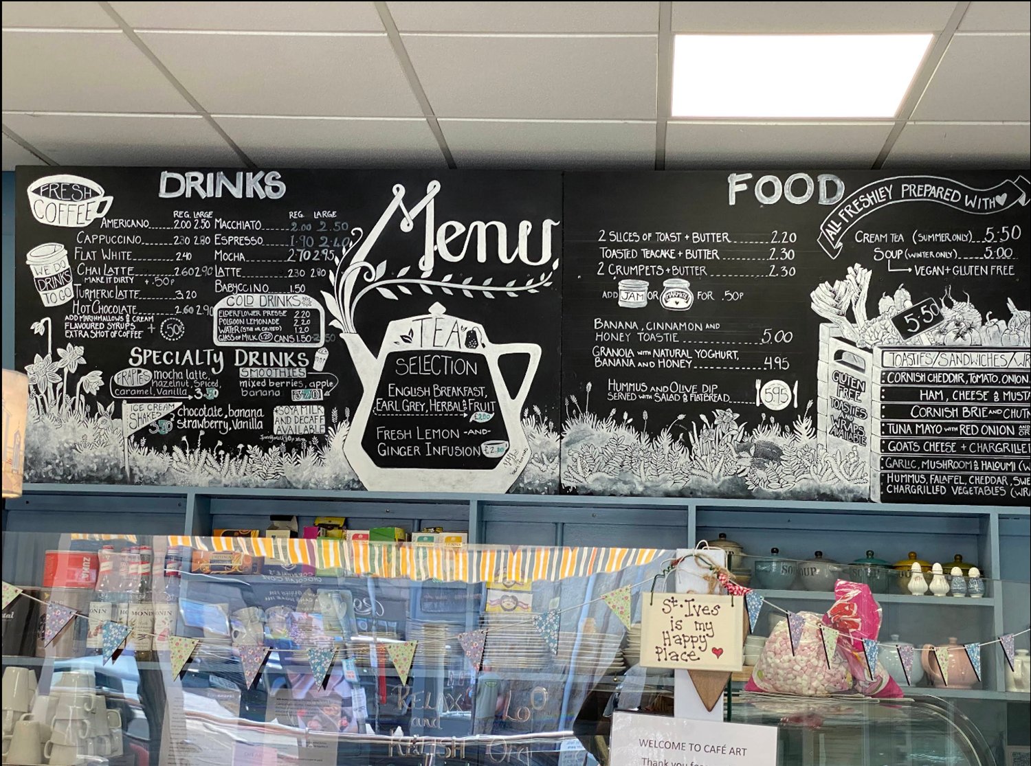 The hand-drawn drinks and food board at Cafe Art